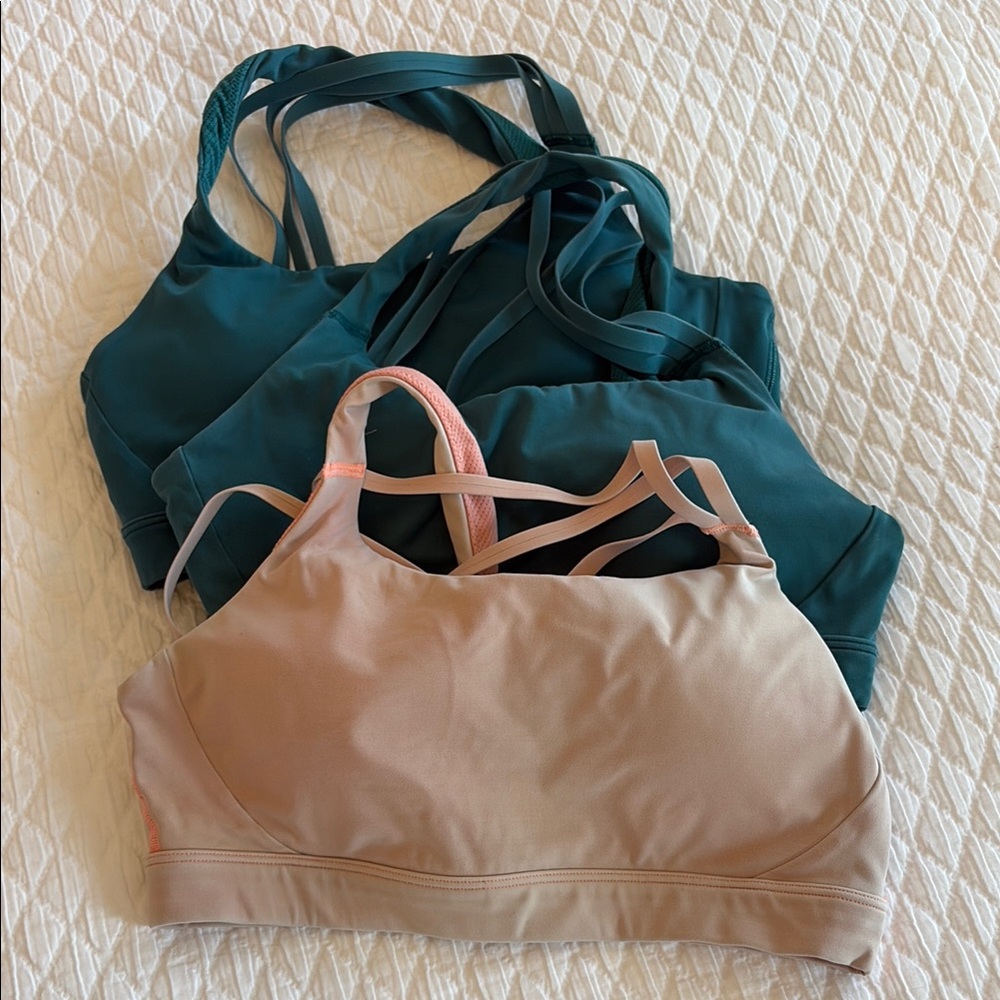 Three Athleta sports bras